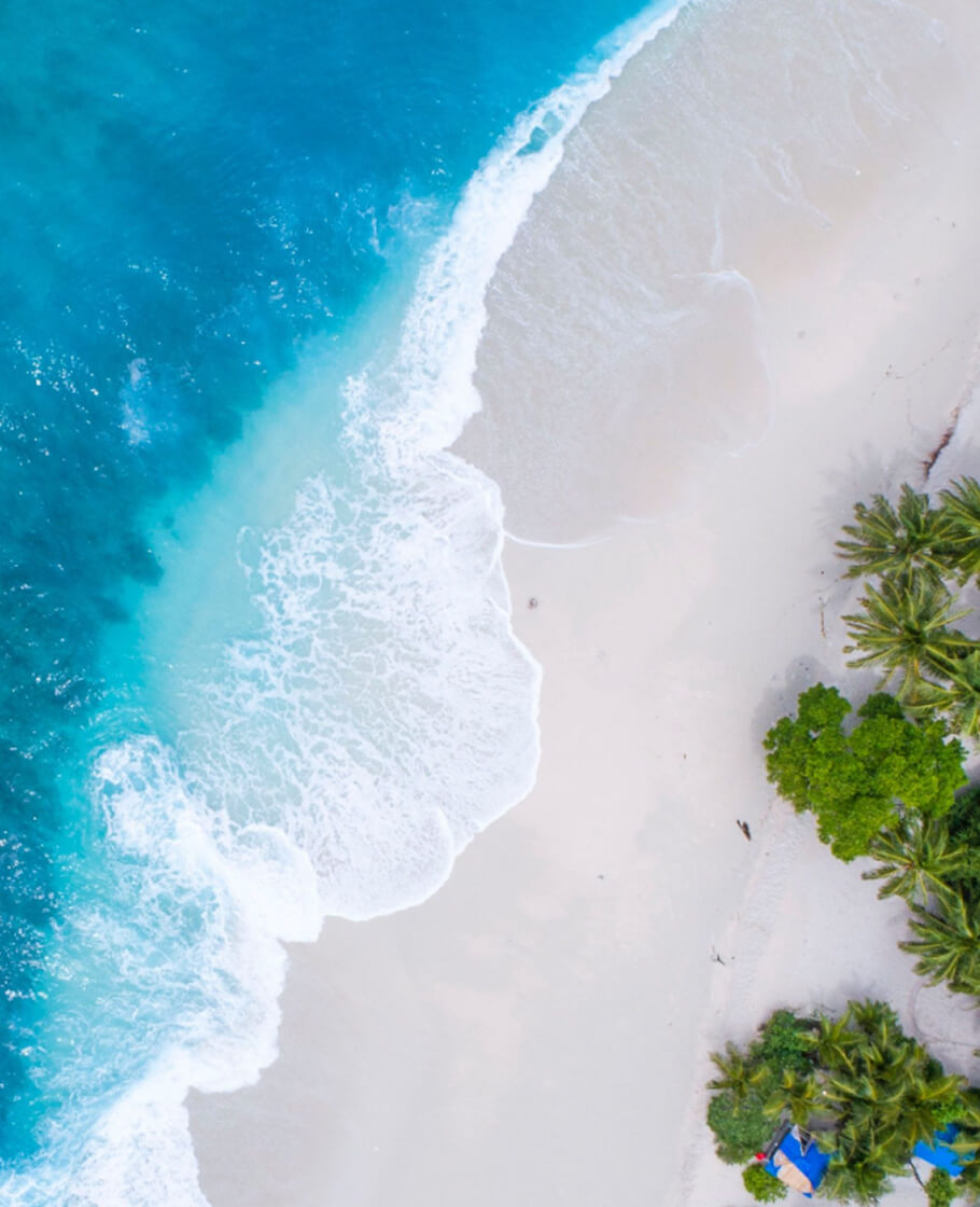 Aerial view of pristine beach with turquoise water